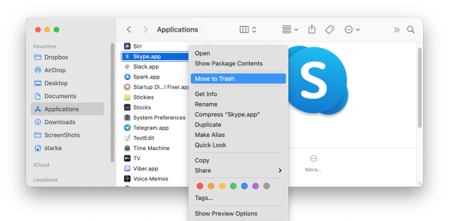 Bilgisayar ekranında Skype logosu ve bir kaldırma ve yeniden yükleme simgesi.